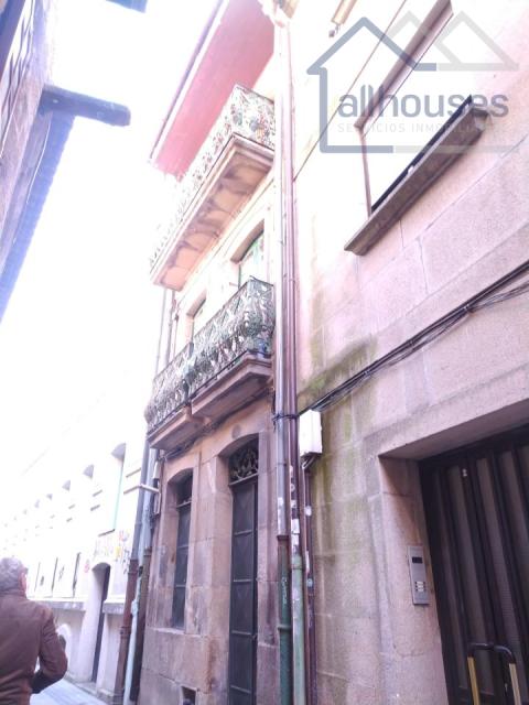Fachada trasera con balcones